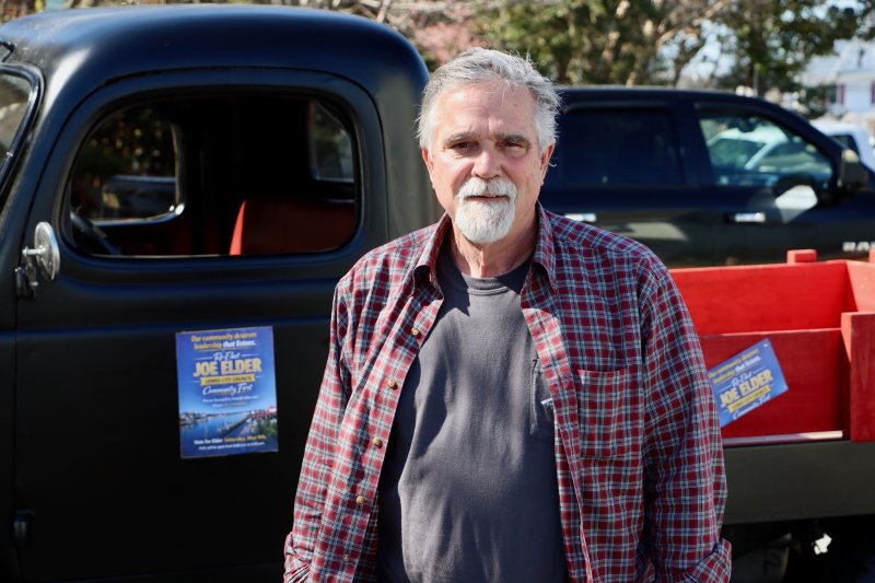 Joe Elder stands in front of Lewes City Hall near the 1941 pickup he built by hand. Elder has filed to run for a second term on Lewes City Council. BILL SHULL PHOTO